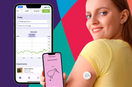 A women wearing a continuous glucose monitor CGM